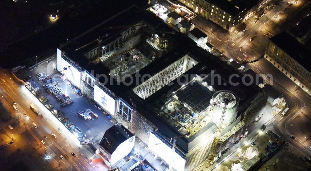 Berlin at night from above - Night view of construction site for the new building the largest and most important cultural construction of the Federal Republic, the building of the Humboldt Forum in the form of the Berlin Palace