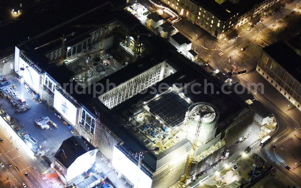 Berlin at night from the bird perspective: Night view of construction site for the new building the largest and most important cultural construction of the Federal Republic, the building of the Humboldt Forum in the form of the Berlin Palace