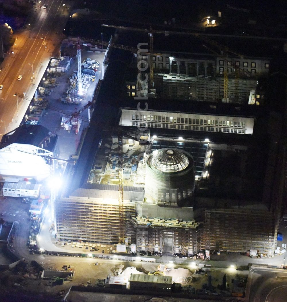 Berlin at night from above - Night view of construction site for the new building the largest and most important cultural construction of the Federal Republic, the building of the Humboldt Forum in the form of the Berlin Palace