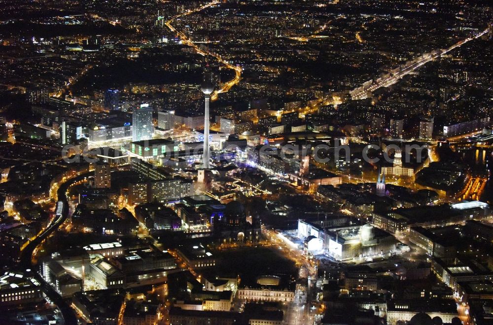 Berlin at night from the bird perspective: Night view of construction site for the new building the largest and most important cultural construction of the Federal Republic, the building of the Humboldt Forum in the form of the Berlin Palace