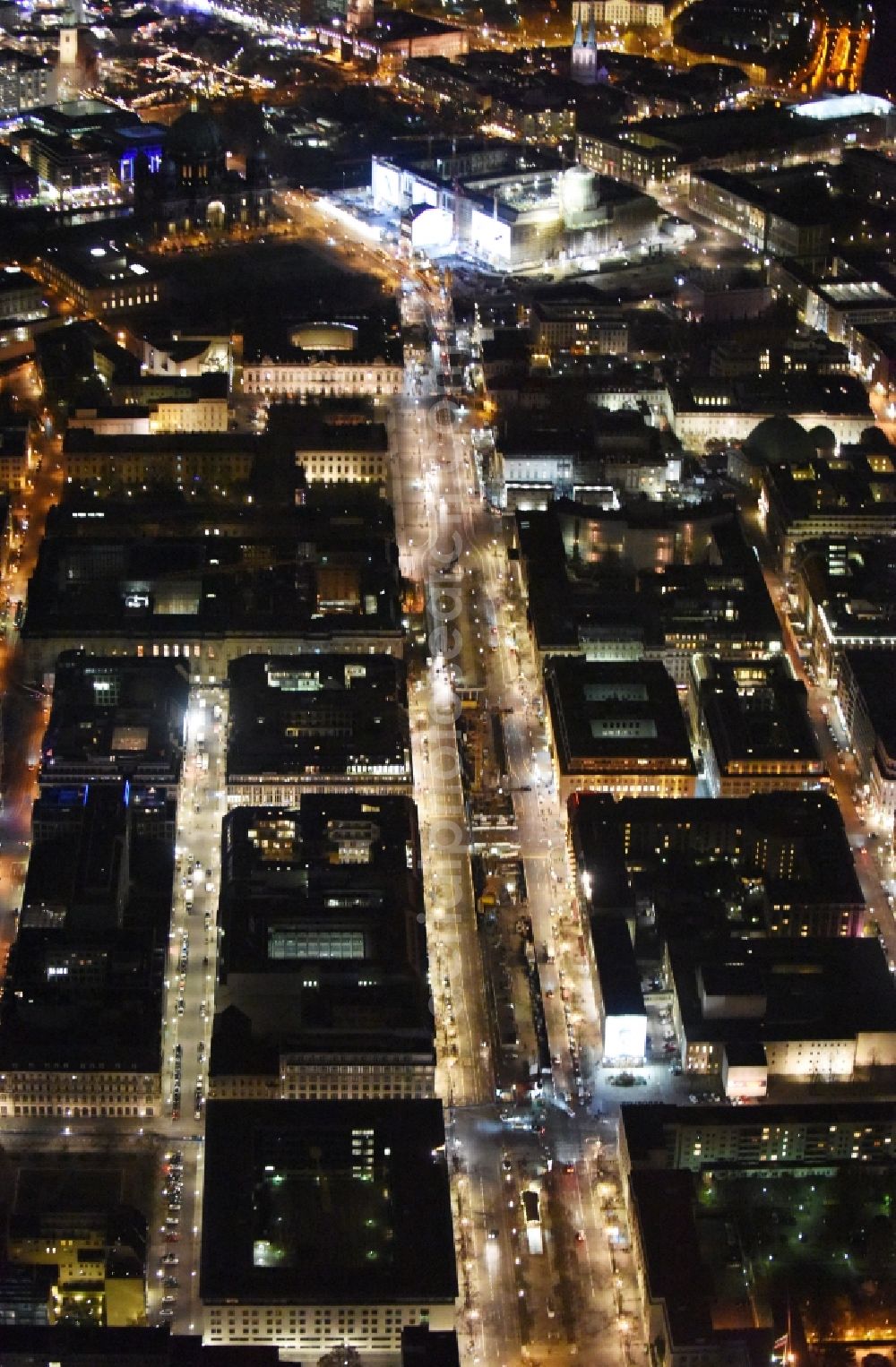 Aerial image at night Berlin - Night view of construction site for the new building the largest and most important cultural construction of the Federal Republic, the building of the Humboldt Forum in the form of the Berlin Palace