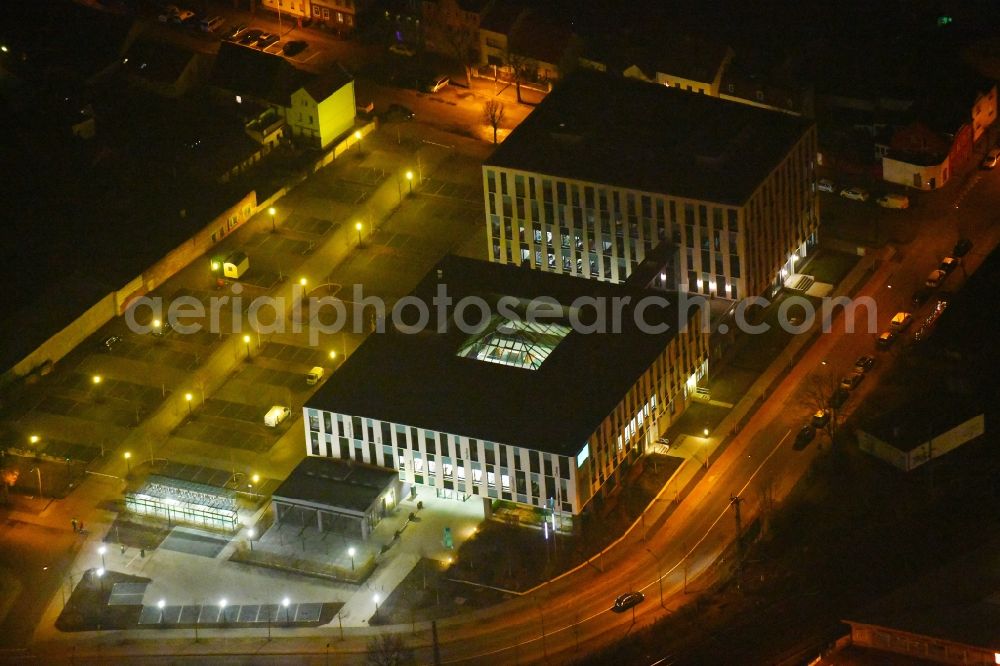 Aerial photograph at night Fürstenwalde/Spree - Night lighting Administration building of the company Bonava Deutschland GmbH Am Nordstern in Fuerstenwalde/Spree in the state Brandenburg, Germany