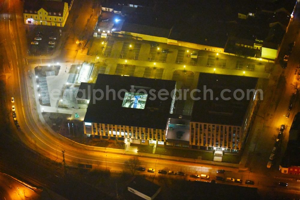 Fürstenwalde/Spree at night from above - Night lighting Administration building of the company Bonava Deutschland GmbH Am Nordstern in Fuerstenwalde/Spree in the state Brandenburg, Germany