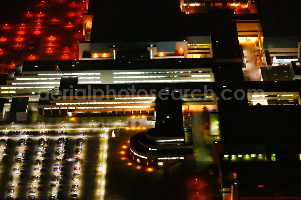 Aerial image at night Dresden - Night lighting Administration building of the company GLOBALFOUNDRIES on Wilschdorfer Landstrasse in Dresden in the state Saxony, Germany