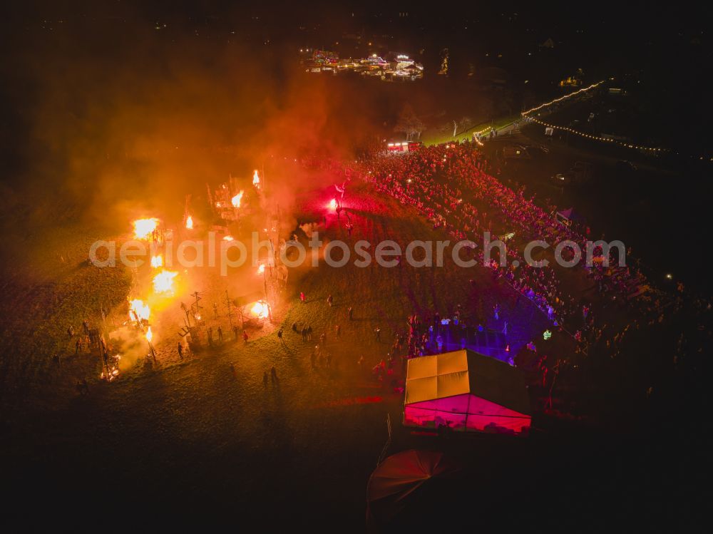 Radebeul at night from above - Night lights and lighting participants of the action on the event site AUTUMN and WINE FESTIVAL on Terrassenstrasse in the district of Koetzschenbroda in Radebeul in the state of Saxony, Germany