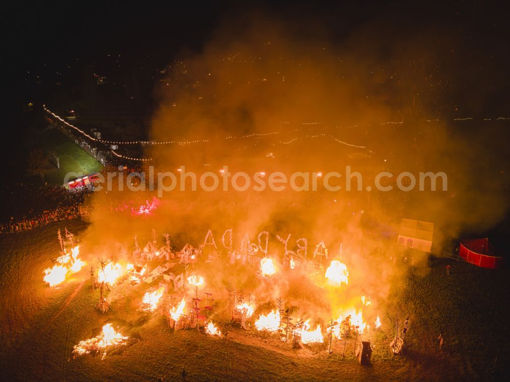 Aerial photograph at night Radebeul - Night lights and lighting participants of the action on the event site AUTUMN and WINE FESTIVAL on Terrassenstrasse in the district of Koetzschenbroda in Radebeul in the state of Saxony, Germany