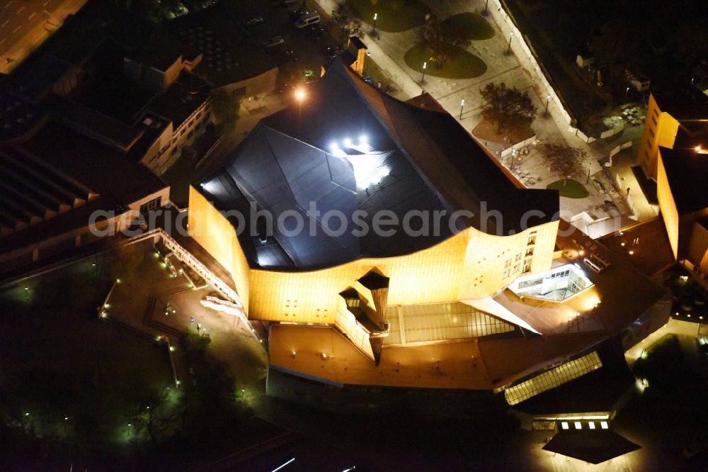 Berlin at night from the bird perspective: Night view building the indoor arena Berliner Philharmonie om Herbert-von-Karajan-Strasse in Berlin in Germany