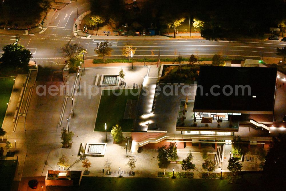 Potsdam at night from above - Night lighting building of the indoor arena DAS MINSK Kunsthaus on street Max-Planck-Strasse in Potsdam in the state Brandenburg, Germany