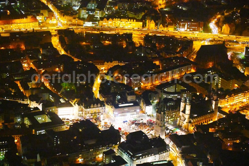 Aerial image at night Halle (Saale) - Night lighting Sale and food stands and trade stalls in the market place on Marktplatz on Roter Turm in Halle (Saale) in the state Saxony-Anhalt, Germany