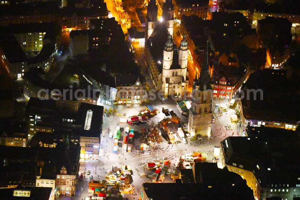 Halle (Saale) at night from above - Night lighting Sale and food stands and trade stalls in the market place on Marktplatz on Roter Turm in Halle (Saale) in the state Saxony-Anhalt, Germany