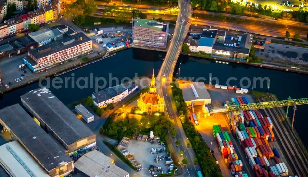 Dortmund at night from the bird perspective: Night lighting administrative building of the State Authority Altes Hafenamt in the district Hafen in Dortmund at Ruhrgebiet in the state North Rhine-Westphalia, Germany