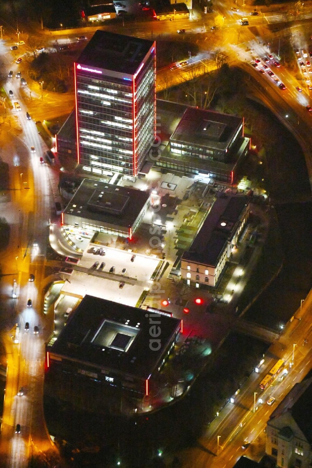 Braunschweig at night from the bird perspective: Night lighting Banking administration building of the financial services company Braunschweigische Landessparkasse on place Friedrich-Wilhelm-Platz in Brunswick in the state Lower Saxony, Germany