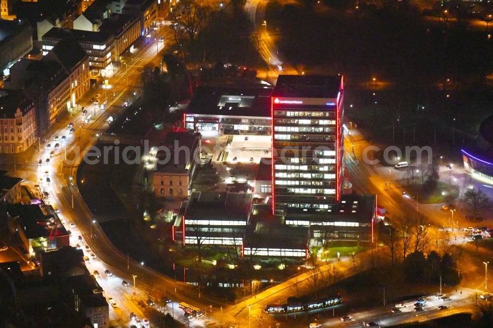 Braunschweig at night from the bird perspective: Night lighting Banking administration building of the financial services company Braunschweigische Landessparkasse on place Friedrich-Wilhelm-Platz in Brunswick in the state Lower Saxony, Germany