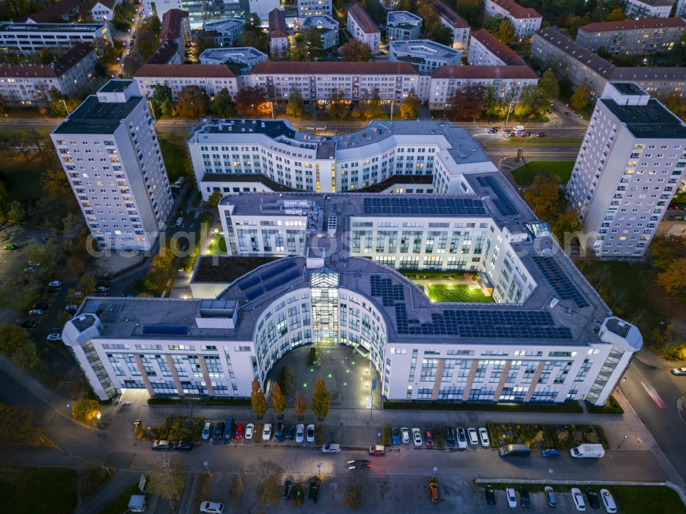 Aerial image at night Dresden - Night lighting banking administration building of the financial services company Saechsische Aufbaubank on street Blueherstrasse in the district Altstadt in Dresden in the state Saxony, Germany