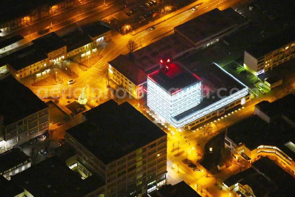 Aerial image at night Kulmbach - Night lighting Banking administration building of the financial services company of Sparkasse Kulmbach-Kronach - Hauptstelle on Fritz-Hornschuch-Strasse in Kulmbach in the state Bavaria, Germany