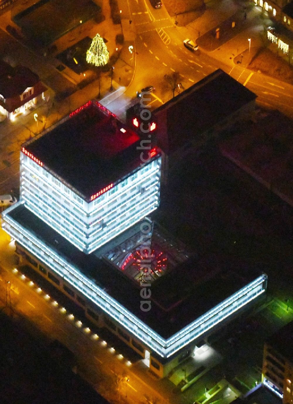 Kulmbach at night from above - Night lighting Banking administration building of the financial services company of Sparkasse Kulmbach-Kronach - Hauptstelle on Fritz-Hornschuch-Strasse in Kulmbach in the state Bavaria, Germany