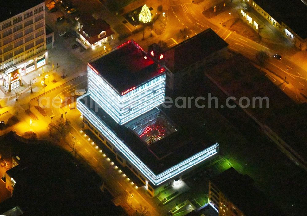 Aerial image at night Kulmbach - Night lighting Banking administration building of the financial services company of Sparkasse Kulmbach-Kronach - Hauptstelle on Fritz-Hornschuch-Strasse in Kulmbach in the state Bavaria, Germany