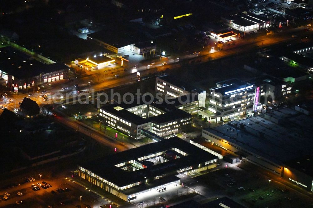 Braunschweig at night from above - Night lighting Banking administration building of the financial services company of Volkswagen Financial Services - Filiale Braunschweig in the district Veltenhof-Ruehme in Braunschweig in the state Lower Saxony, Germany