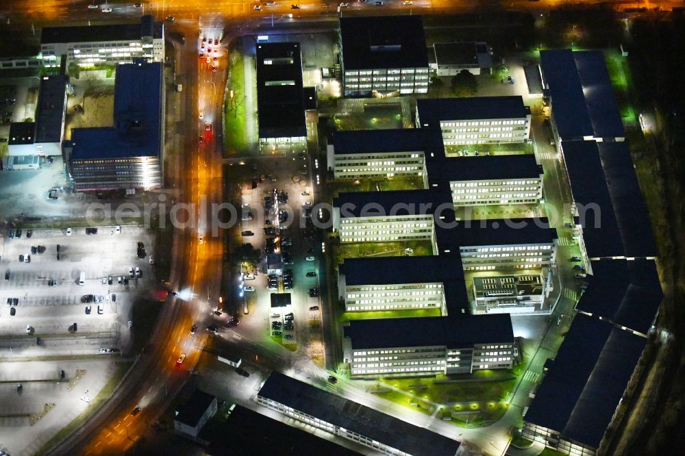 Braunschweig at night from above - Night lighting Banking administration building of the financial services company of Volkswagen Financial Services - Filiale Braunschweig in the district Veltenhof-Ruehme in Braunschweig in the state Lower Saxony, Germany