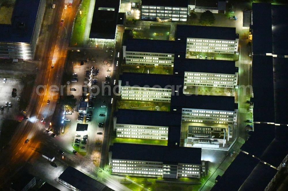 Braunschweig at night from above - Night lighting Banking administration building of the financial services company of Volkswagen Financial Services - Filiale Braunschweig in the district Veltenhof-Ruehme in Braunschweig in the state Lower Saxony, Germany