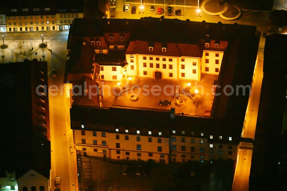 Erfurt at night from the bird perspective: Night lighting administrative building of the State Authority Thueringer Staatskanzlei on Regierungsstrasse in the district Altstadt in Erfurt in the state Thuringia, Germany