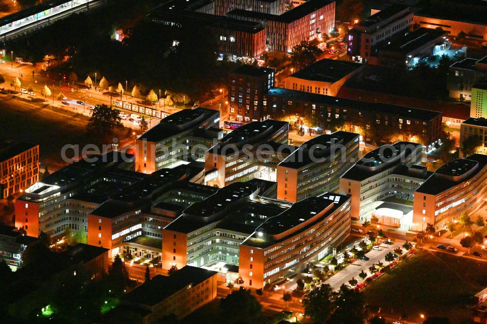 Berlin at night from above - Night lighting office and administration buildings of the insurance company Allianz Campus Berlin in the district Adlershof in Berlin, Germany