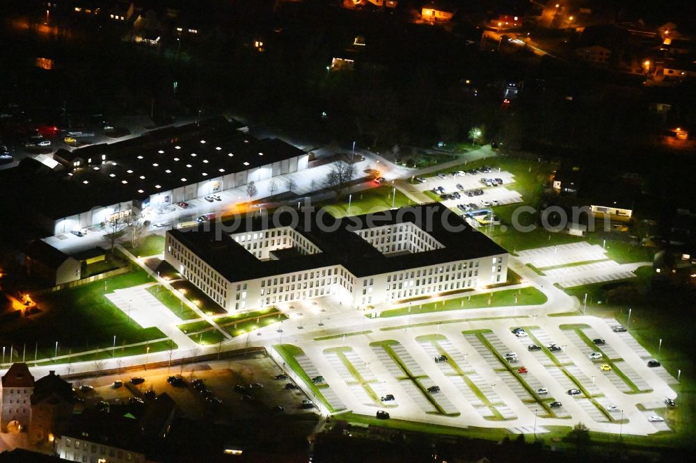 Haldensleben at night from above - Night lighting Office and administration buildings of the insurance company Deutsche Rentenversicherung on Bornsche Strasse in Haldensleben in the state Saxony-Anhalt, Germany