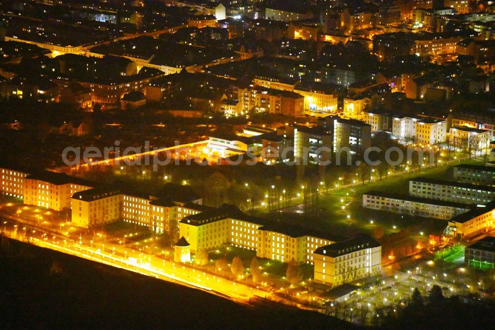 Leipzig at night from the bird perspective: Night lighting Office and administration buildings of the insurance company Deutsche Rentenversicherung Mitteldeutschland at the Georg-Schumann-Strasse in the district Nord in Leipzig in the state Saxony, Germany