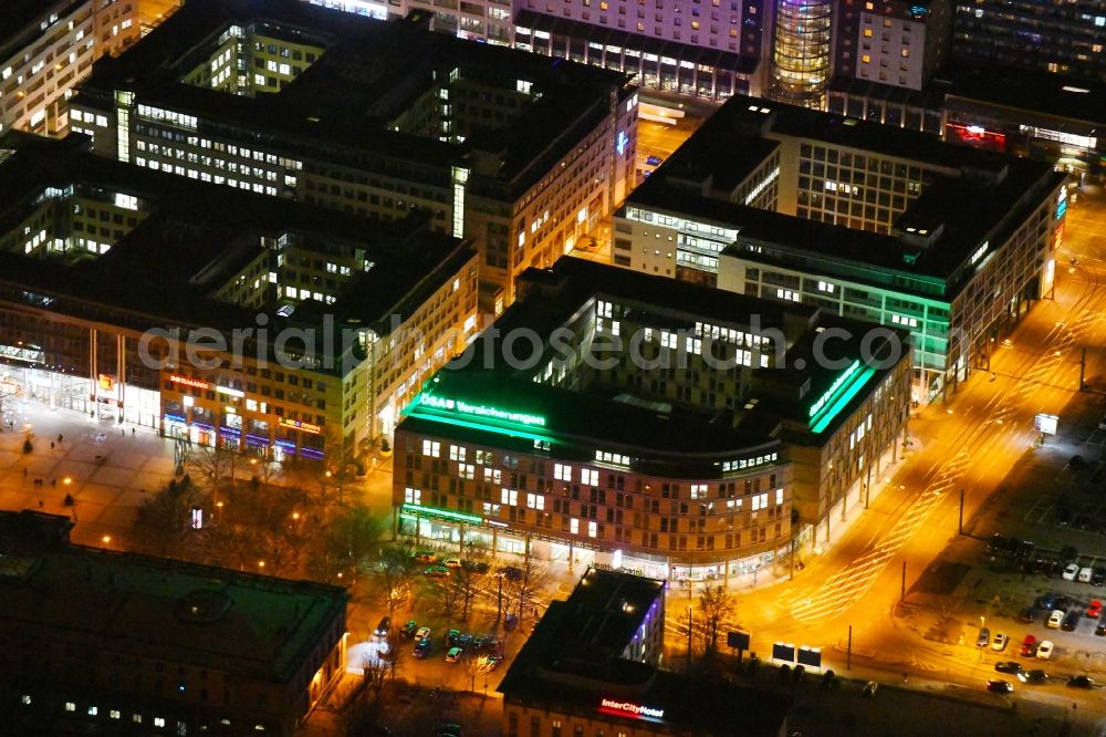 Magdeburg at night from above - Night lighting Office and administration buildings of the insurance company of OeSA Versicherungen on Bahnhofstrasse corner Hasselbachstrasse in the district Zentrum in Magdeburg in the state Saxony-Anhalt, Germany