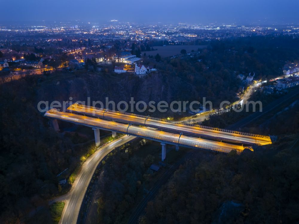 Aerial image at night Dresden - Night lighting routing and lanes in the course of the motorway bridge structure of the BAB A 17 Weisseritztalbruecke on street Weisseritztalbruecke in the district Coschuetz in Dresden in the state Saxony, Germany