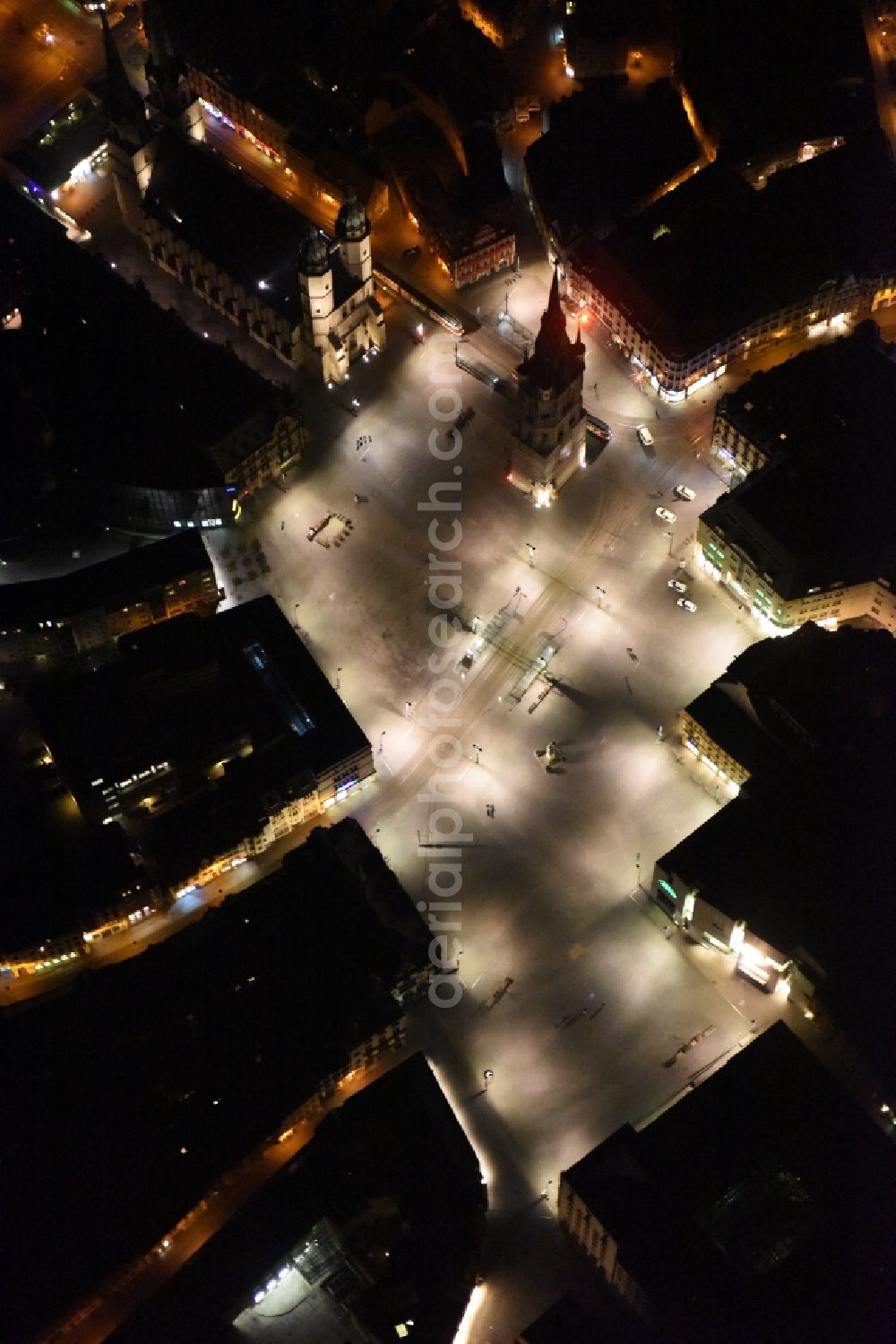 Aerial photograph at night Halle (Saale) - Night aerial view from the old town center at the Market Church of Our dear Lady, Red Tower and market square in Halle (Saale) in Saxony-Anhalt