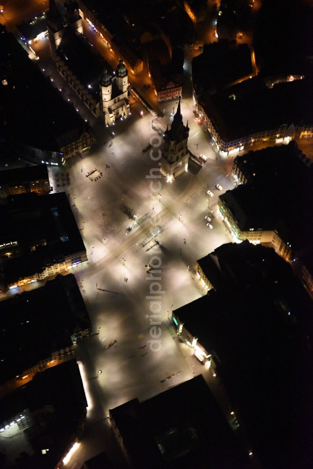 Aerial image at night Halle (Saale) - Night aerial view from the old town center at the Market Church of Our dear Lady, Red Tower and market square in Halle (Saale) in Saxony-Anhalt