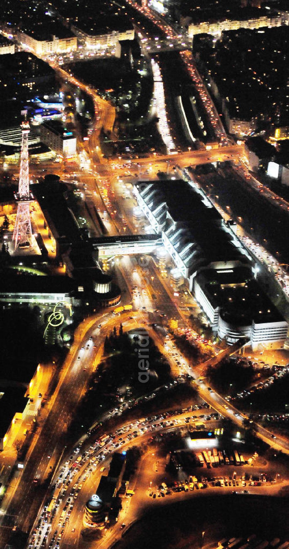 Aerial photograph at night Berlin - Nachtluftbild vom Areal des Funkturm / ICC im Messegelände in Berlin Charlottenburg. Night shot of the area of the radio tower / ICC in the Exhibition Grounds in Berlin Charlottenburg.