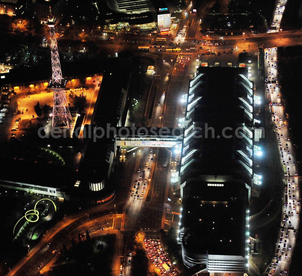 Berlin at night from above - Nachtluftbild vom Areal des Funkturm / ICC im Messegelände in Berlin Charlottenburg. Night shot of the area of the radio tower / ICC in the Exhibition Grounds in Berlin Charlottenburg.