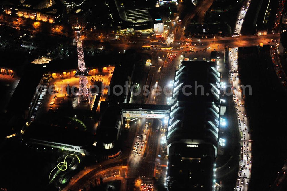 Berlin at night from the bird perspective: Nachtluftbild vom Areal des Funkturm / ICC im Messegelände in Berlin Charlottenburg. Night shot of the area of the radio tower / ICC in the Exhibition Grounds in Berlin Charlottenburg.