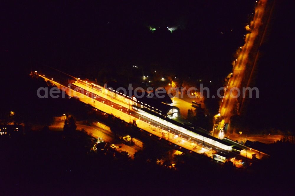 Potsdam at night from the bird perspective: Night aerial photo of the station Parc Sanssouci Hbf in Potsdam in the state Brandenburg