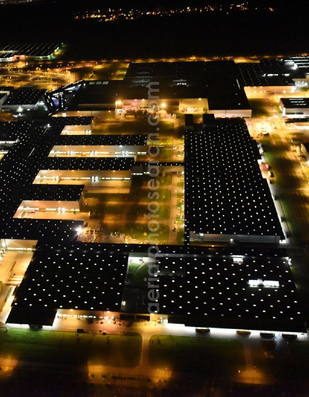 Leipzig at night from above - Night aerial view from the site location of Bayerische Motoren Werke AG BMW Leipzig in Saxony