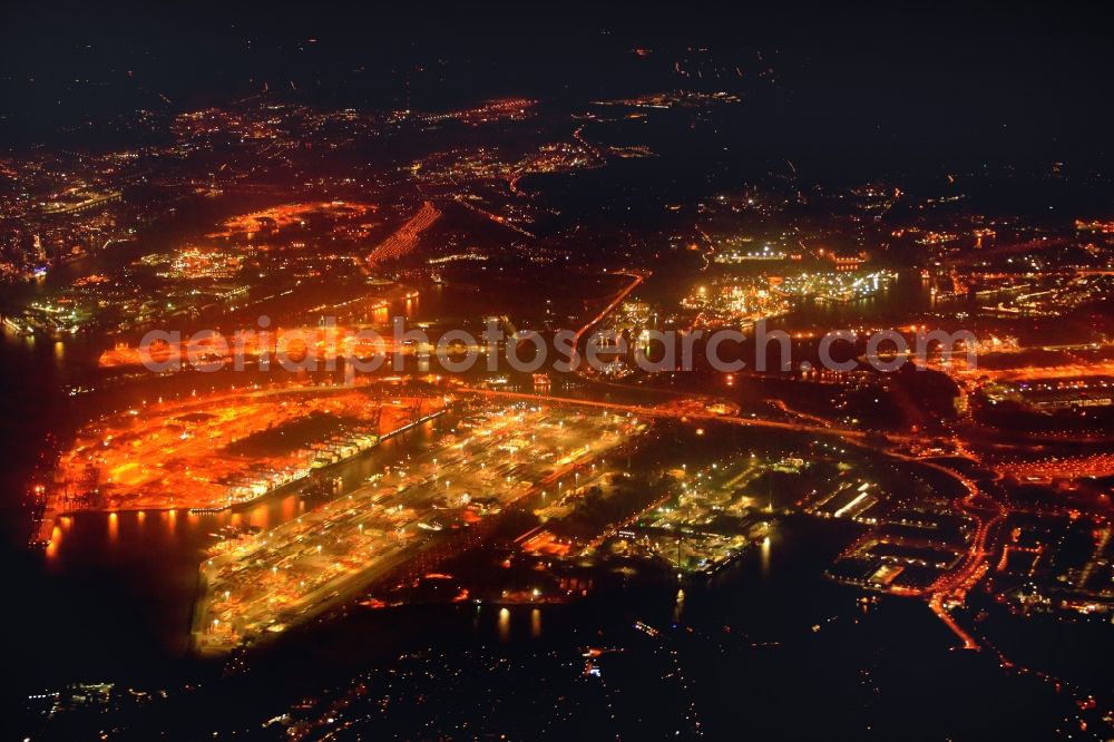 Aerial image at night Hamburg - Night lighting container terminal of the international port in the district Waltershof in Hamburg, Germany