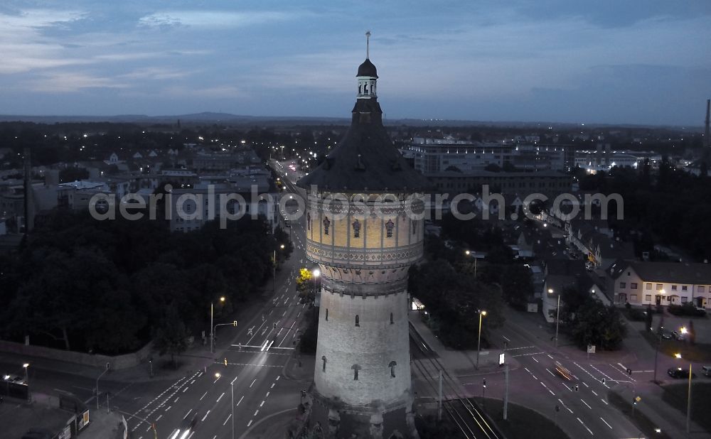 Halle (Saale) at night from the bird perspective: Night aerial view from the listed building tower water tower-Nord in Halle (Saale) in Saxony-Anhalt