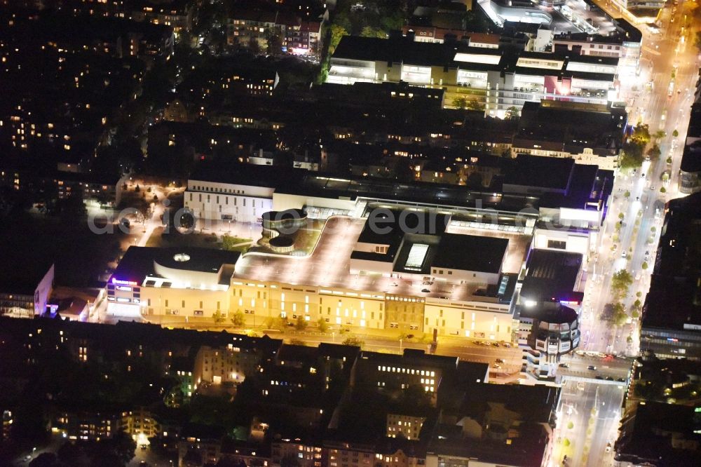 Aerial image at night Berlin - Night view the shopping center Boulevard in the Schlossstrasse Berlin. The owner of the shopping centre ist Klepierre Management. In the picture the Bierpinsel and the Joachim Tiburtius bridge