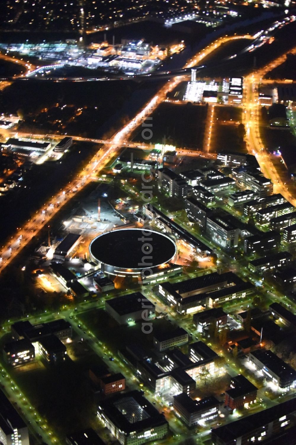 Aerial photograph at night Berlin - Night View of electron storage ring BESSY - the third generation synchrotron radiation source in Berlin - Adlershof