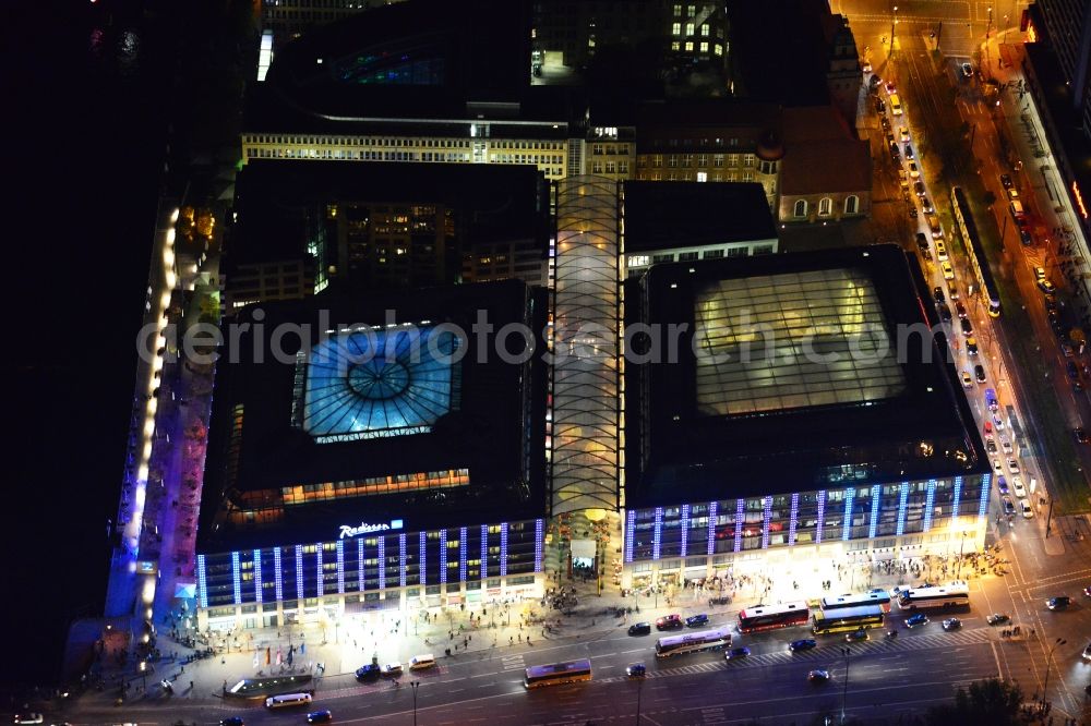 Aerial photograph at night Berlin - Night view of the illuminated City Quartier Dom Aquaree with the AquaDom & Sea Life Aquarium and the Radisson Blu Hotel at the street Karl-Liebknecht-Strasse in Berlin-Mitte