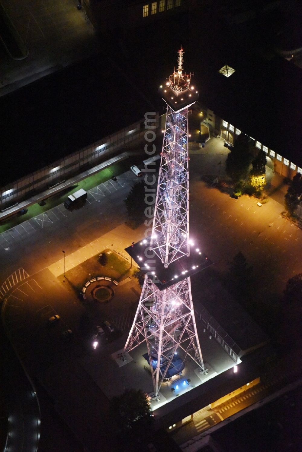 Aerial image at night Berlin - Night view television Tower Funkturm Berlin on Hammarskjoeldplatz destrict Charlottenburg in Berlin