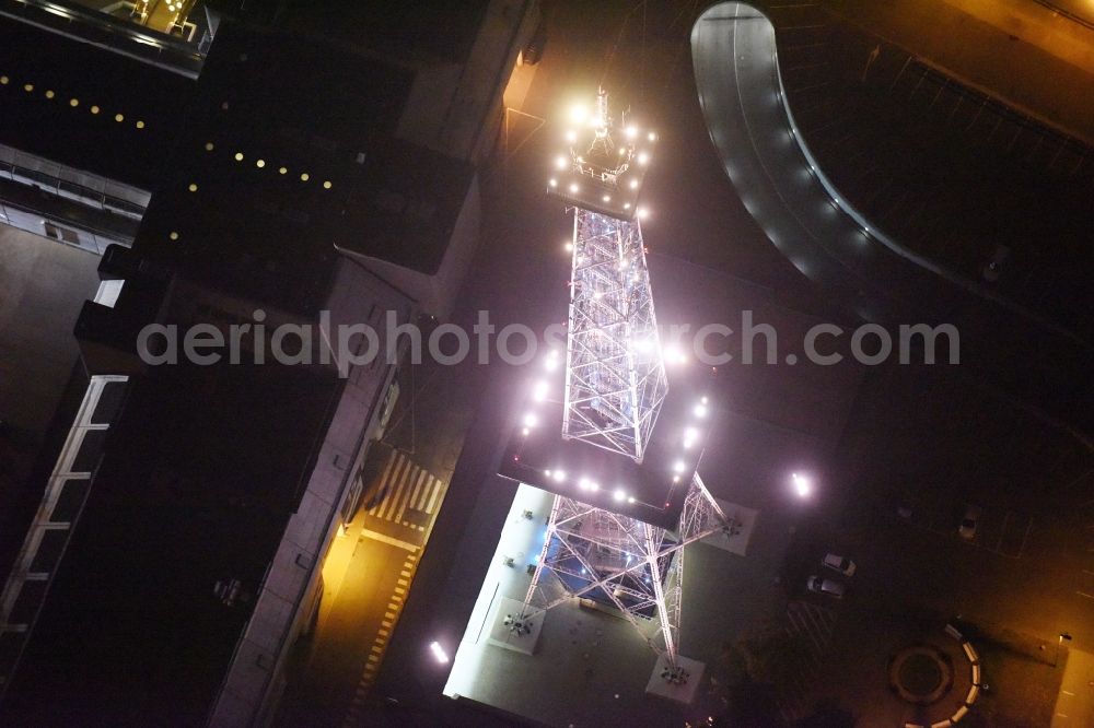 Aerial image at night Berlin - Night view television Tower Funkturm Berlin on Hammarskjoeldplatz destrict Charlottenburg in Berlin