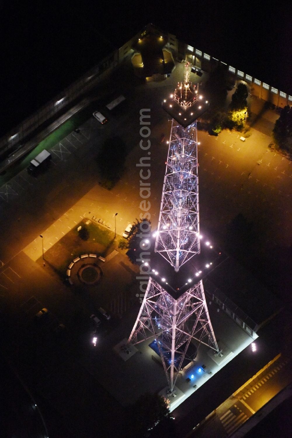 Aerial image at night Berlin - Night view television Tower Funkturm Berlin on Hammarskjoeldplatz destrict Charlottenburg in Berlin