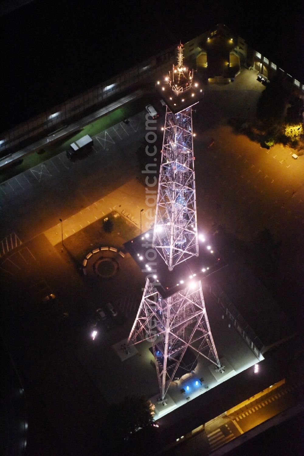 Berlin at night from the bird perspective: Night view television Tower Funkturm Berlin on Hammarskjoeldplatz destrict Charlottenburg in Berlin