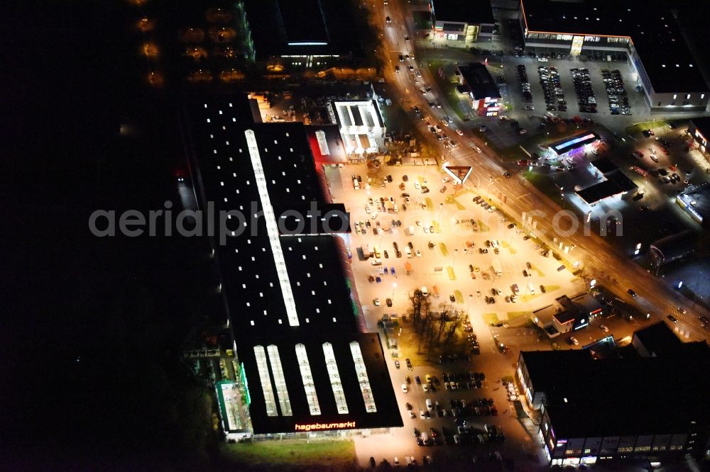 Lübeck at night from above - Night view building of the construction market of hagebaumarkt in Luebeck in the state Schleswig-Holstein