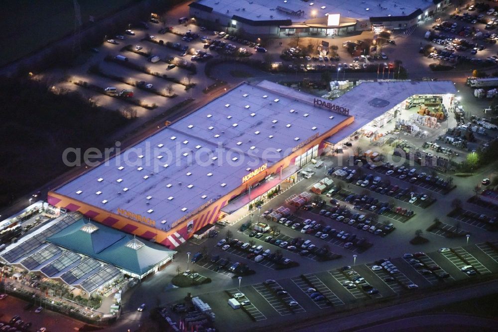 Aerial photograph at night Fredersdorf-Vogelsdorf - Night view building of the construction market Hornbach in the district Vogelsdorf in Fredersdorf-Vogelsdorf in the state Brandenburg