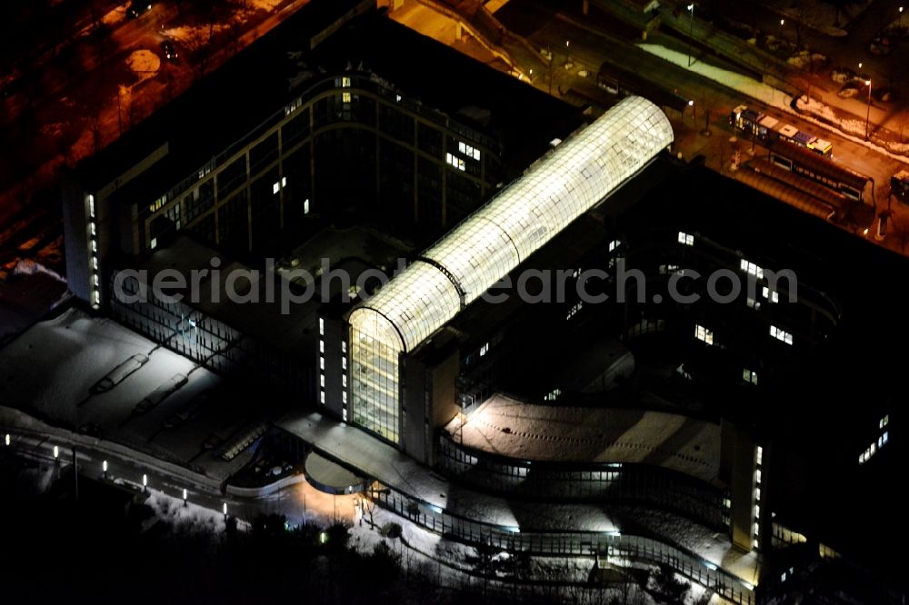 München at night from above - Night aerial view of the illuminated bus terminal at the Hanns-Seidel-Platz in Munich in Bavaria