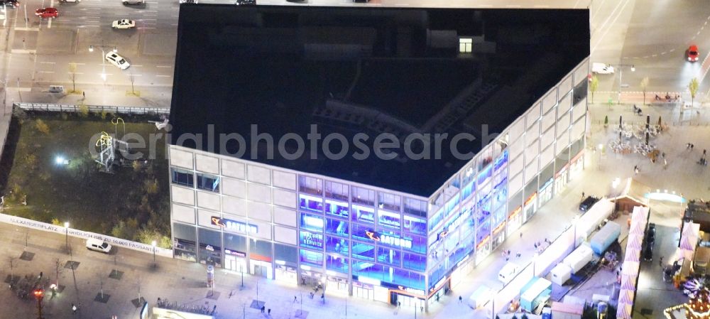 Berlin at night from above - Night view building of the shopping center am Alexanderplatz in Berlin